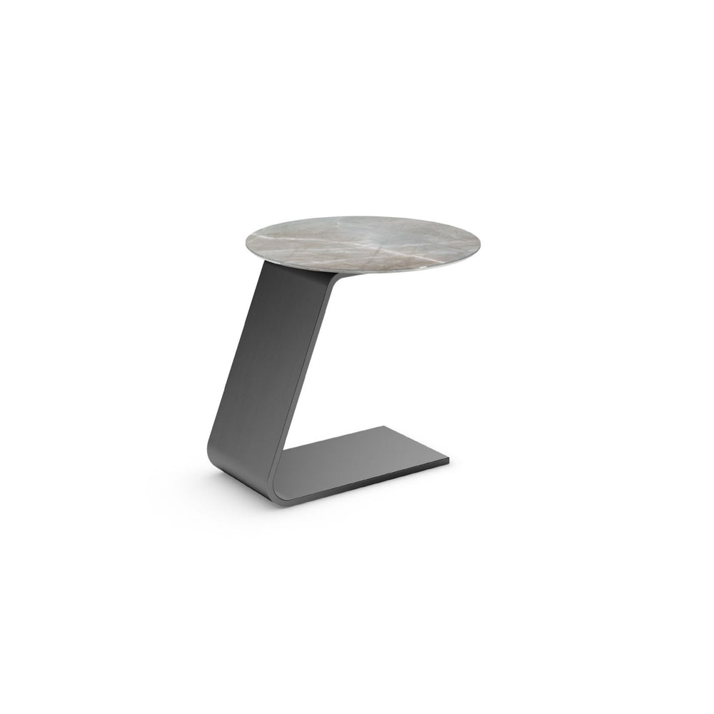A compact side table with a light grey round top and a dark angled base.