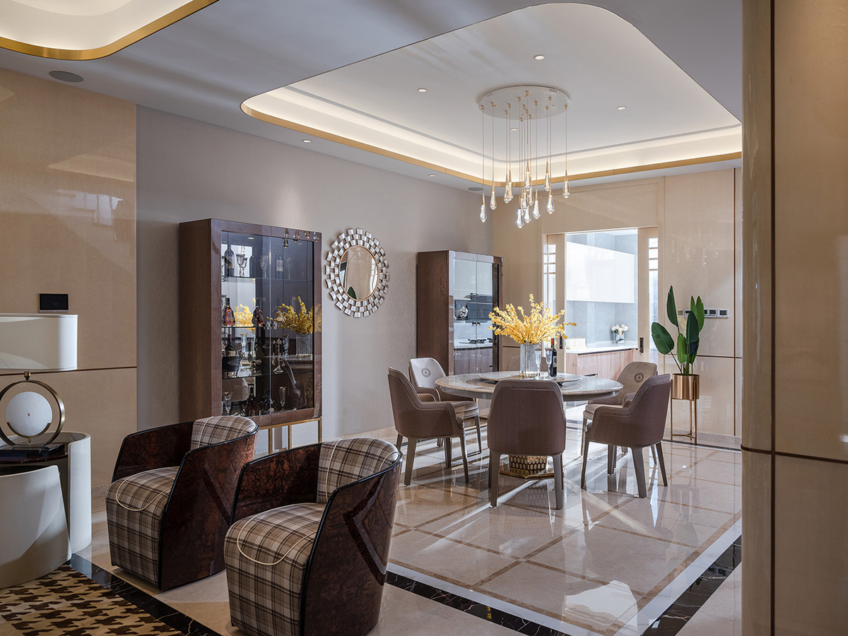 Custom dining table with upholstered dining chairs for a hotel restaurant