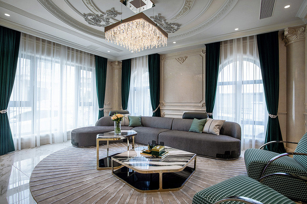 Living room in the published Changsha Country Garden project with a curved grey sofa, green lounge chairs and patterned tables